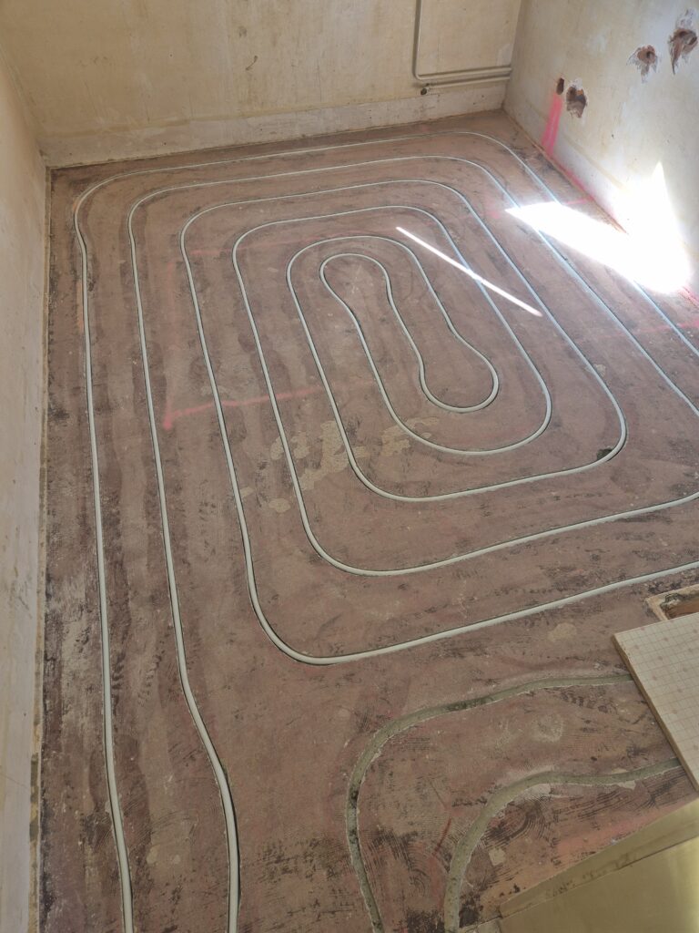 Installation chauffage au sol en rénovation complète à Yverdon